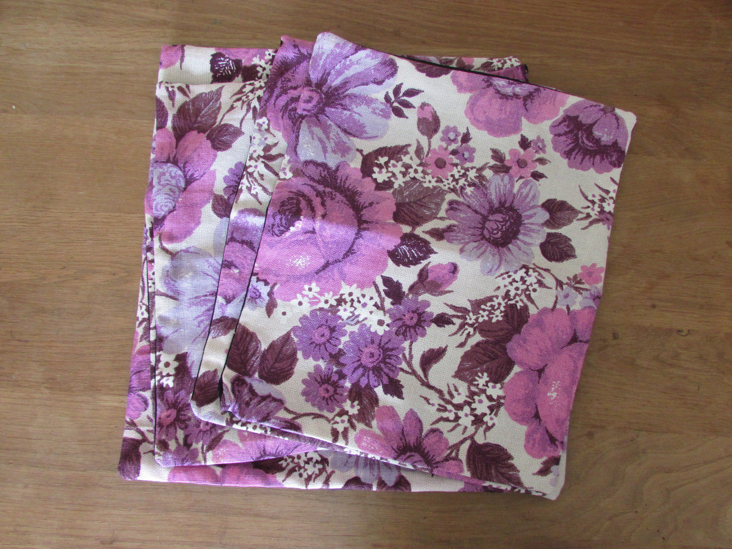 Home-made vintage purple & pink floral cushion cover with contrast black reverse