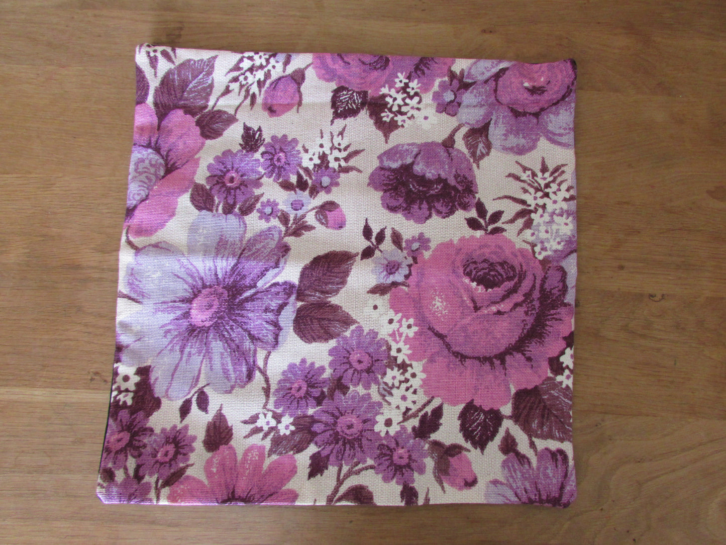 Home-made vintage purple & pink floral cushion cover with contrast black reverse