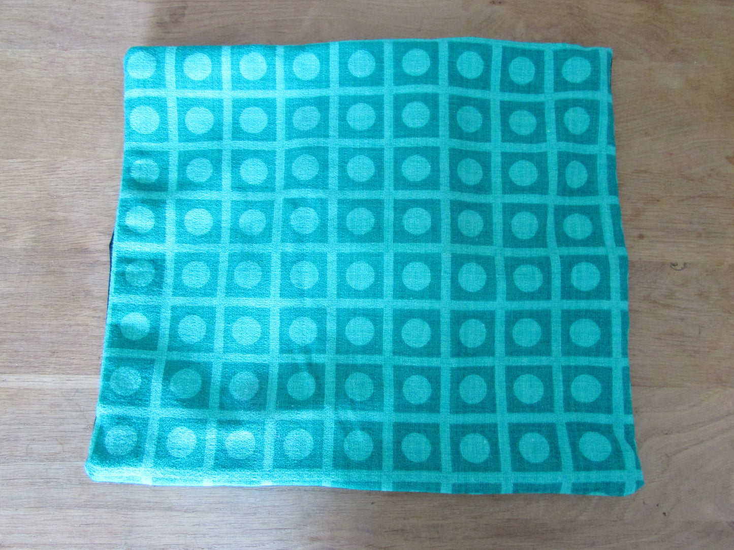 Home-made vintage green op art pattern cushion cover with contrast black reverse