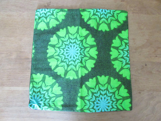 Home-made vintage green tulips circles cushion cover with contrast black reverse