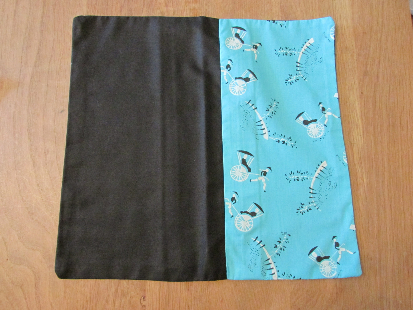 Home-made 1950s two-tone rickshaw pattern cushion cover with contrast black reverse