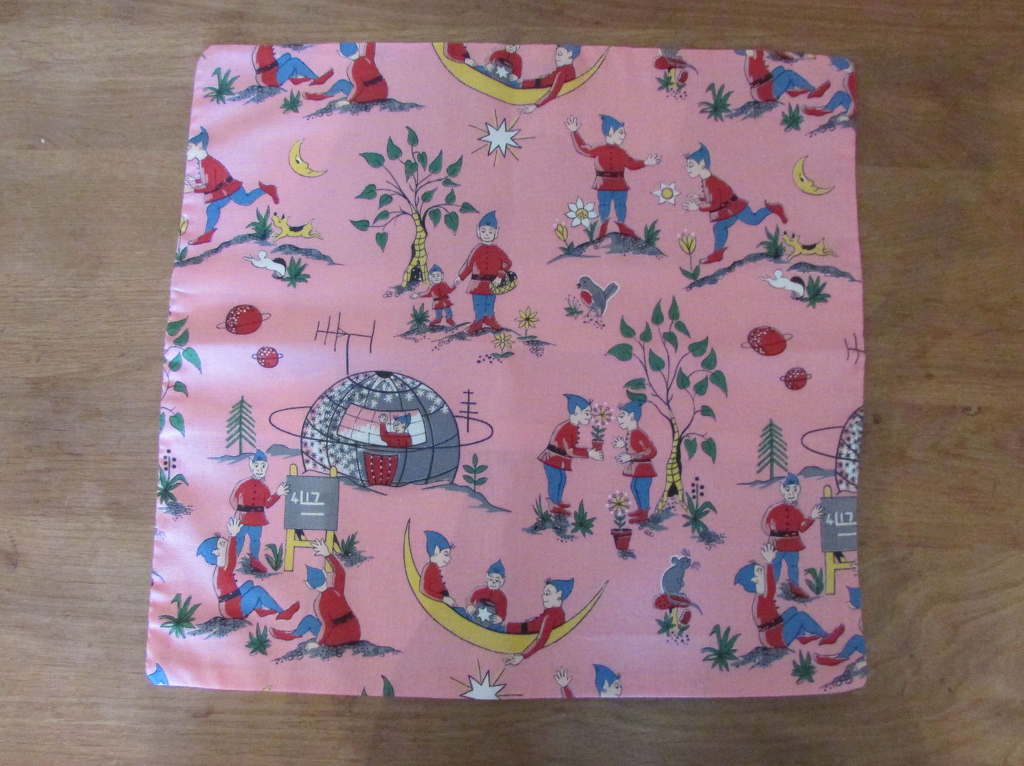 Home-made mid-century pink elf land cushion cover with contrast reverse