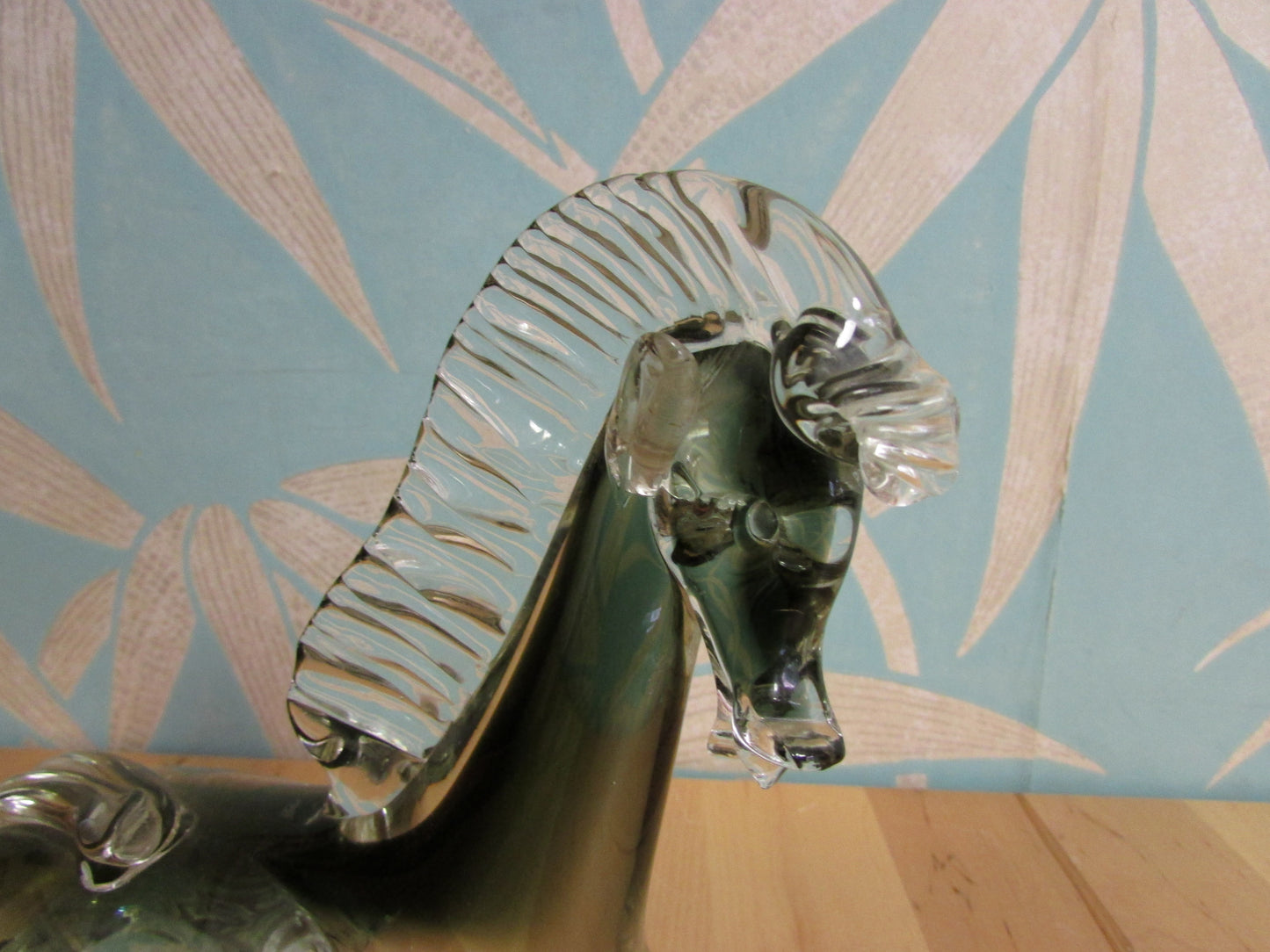 Vintage solid glass Trojan-style resting horse statuette