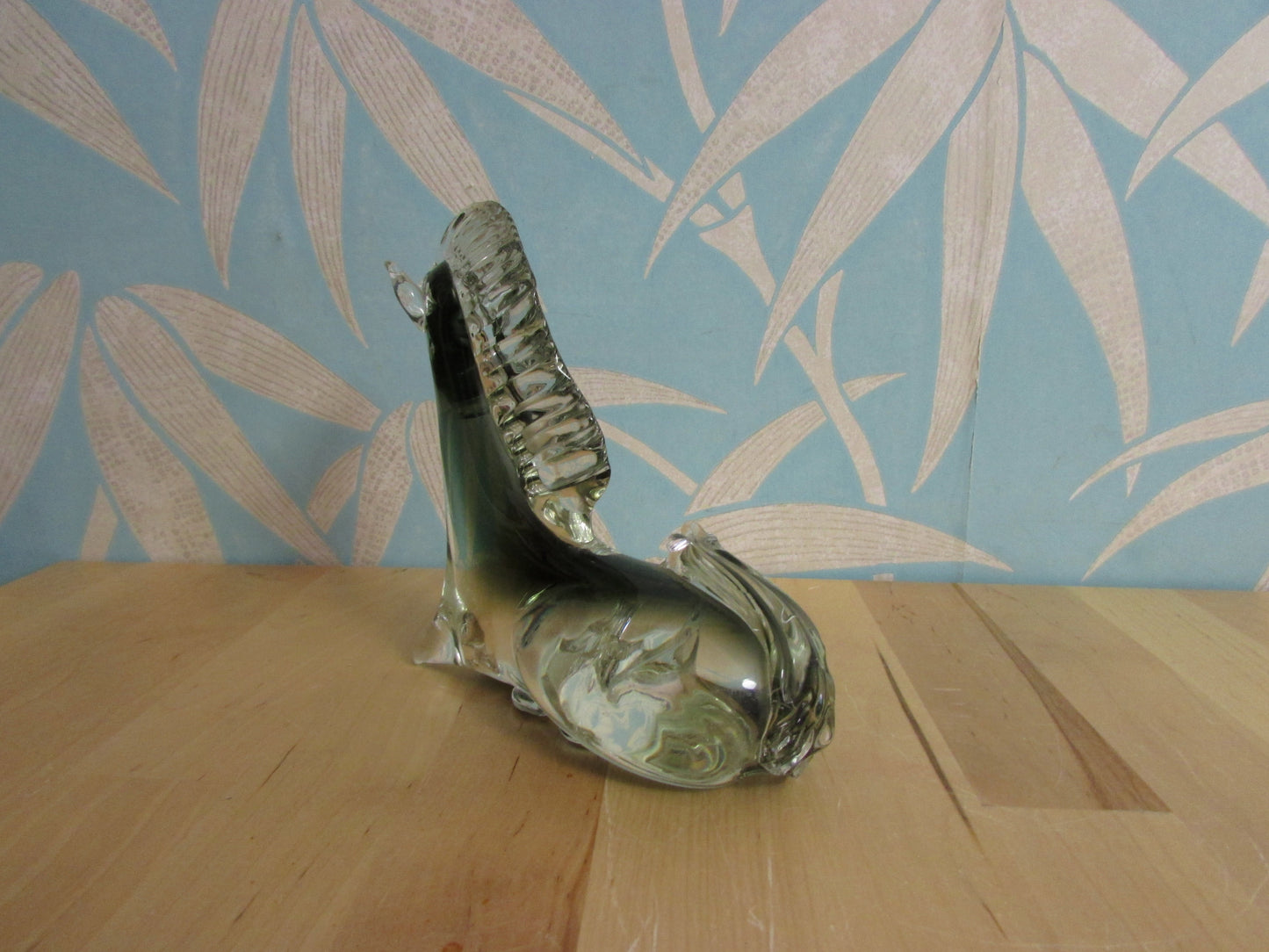 Vintage solid glass Trojan-style resting horse statuette