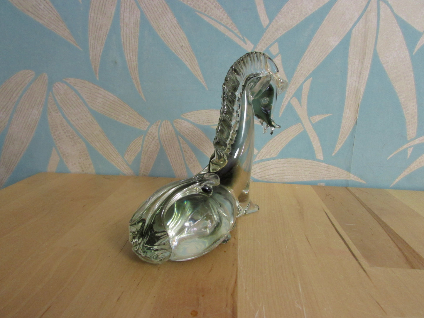 Vintage solid glass Trojan-style resting horse statuette