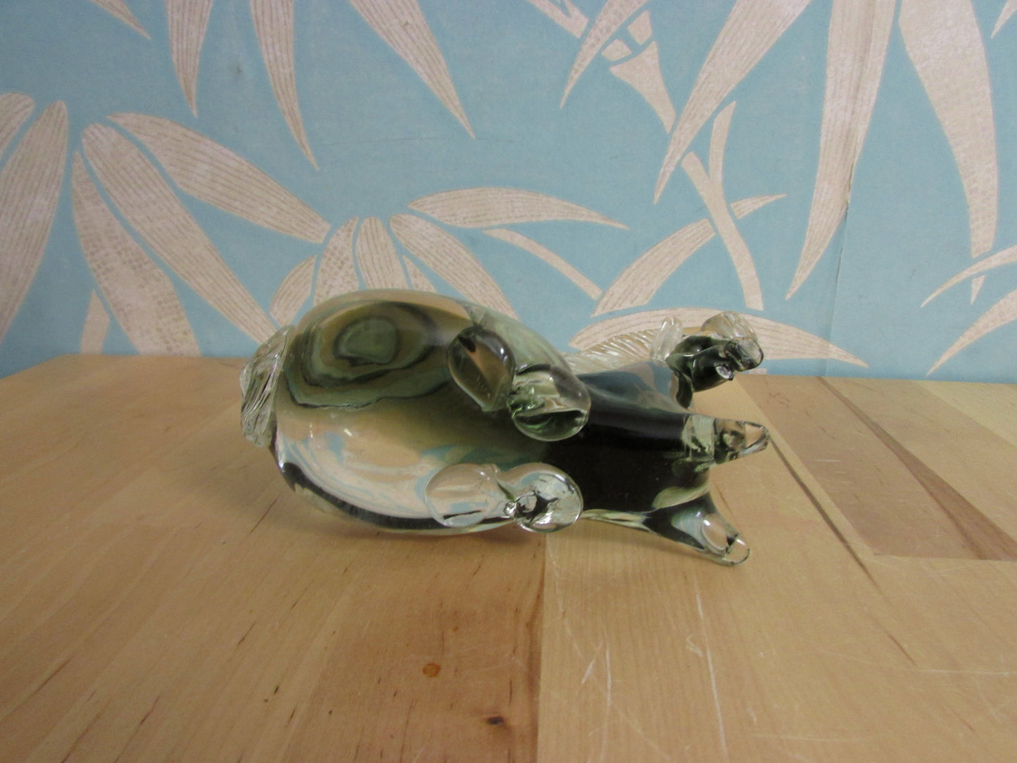 Vintage solid glass Trojan-style resting horse statuette