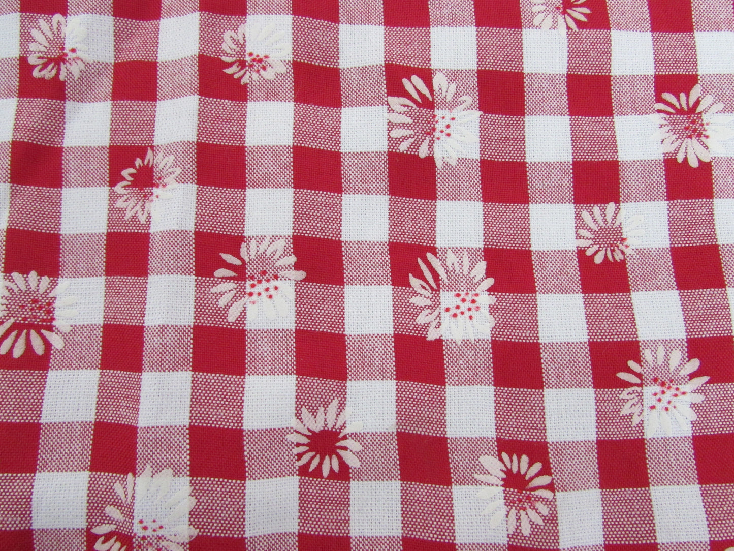 Home-made vintage red & white Gingham cushion cover with allover daisy motif and contrast white reverse