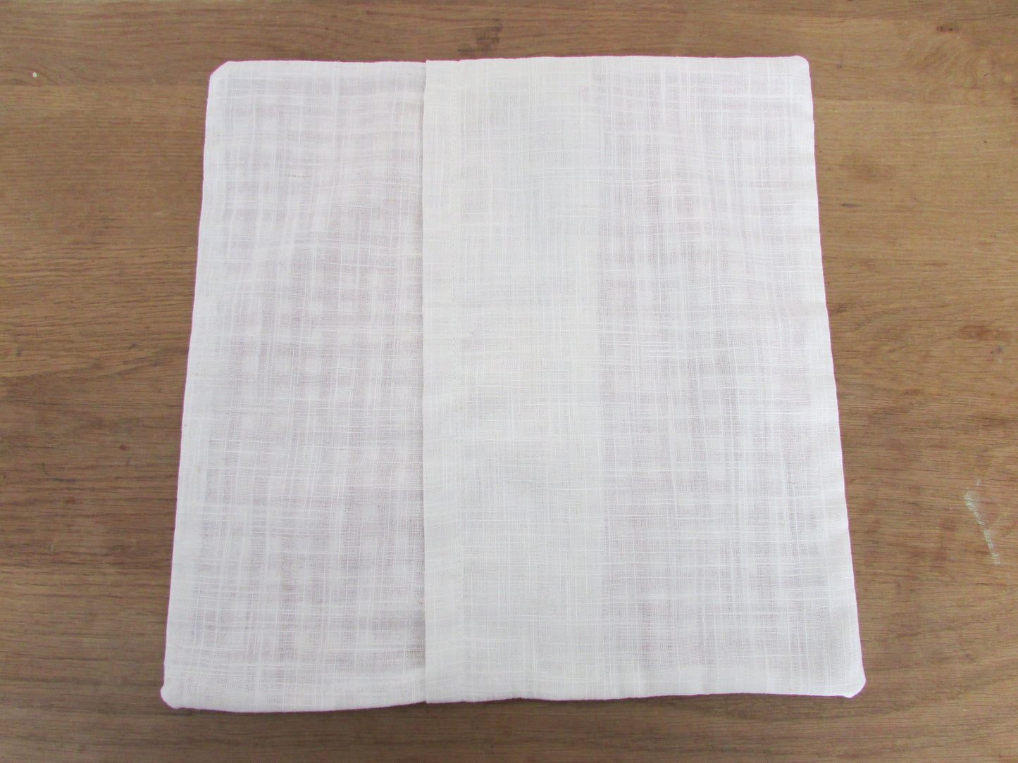 Home-made vintage red & white Gingham cushion cover with allover daisy motif and contrast white reverse