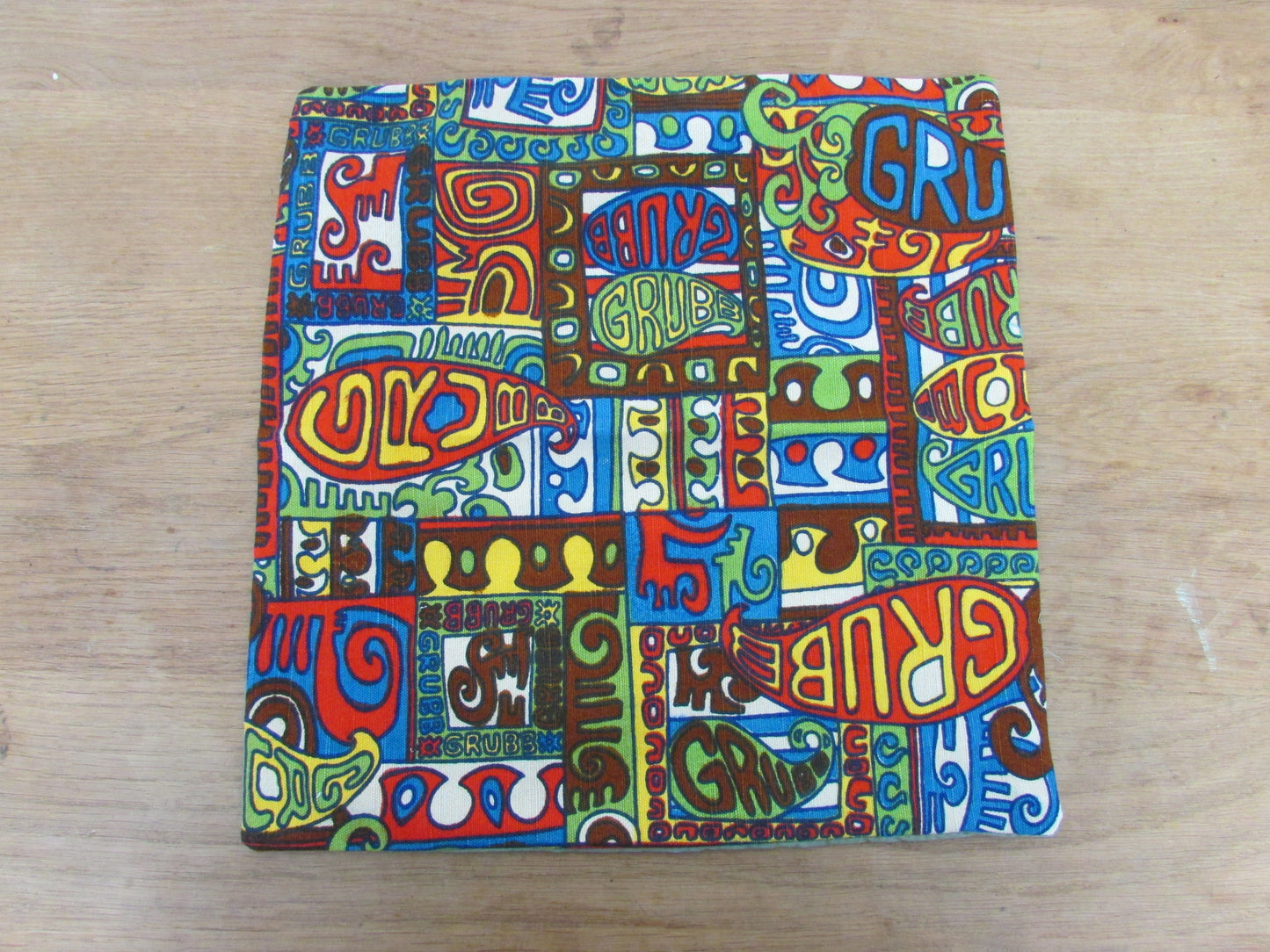 Home-made 1960s/70s Robert Bruce "Grubb" psychedelic pattern cushion cover with contrast olive green reverse