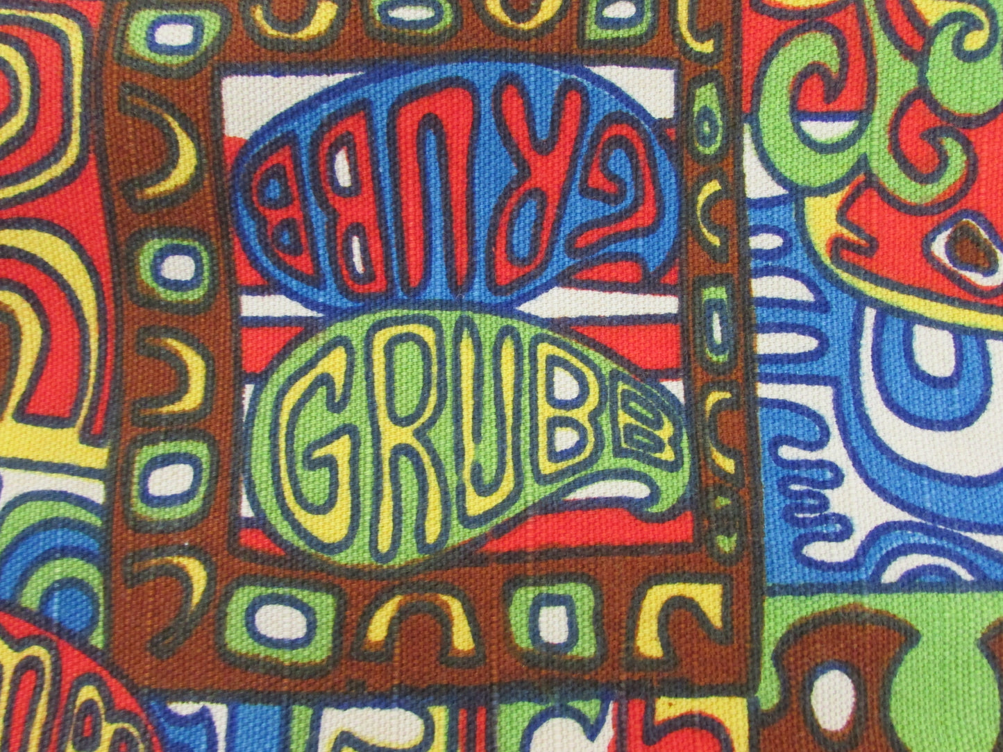 Home-made 1960s/70s Robert Bruce "Grubb" psychedelic pattern cushion cover with contrast olive green reverse