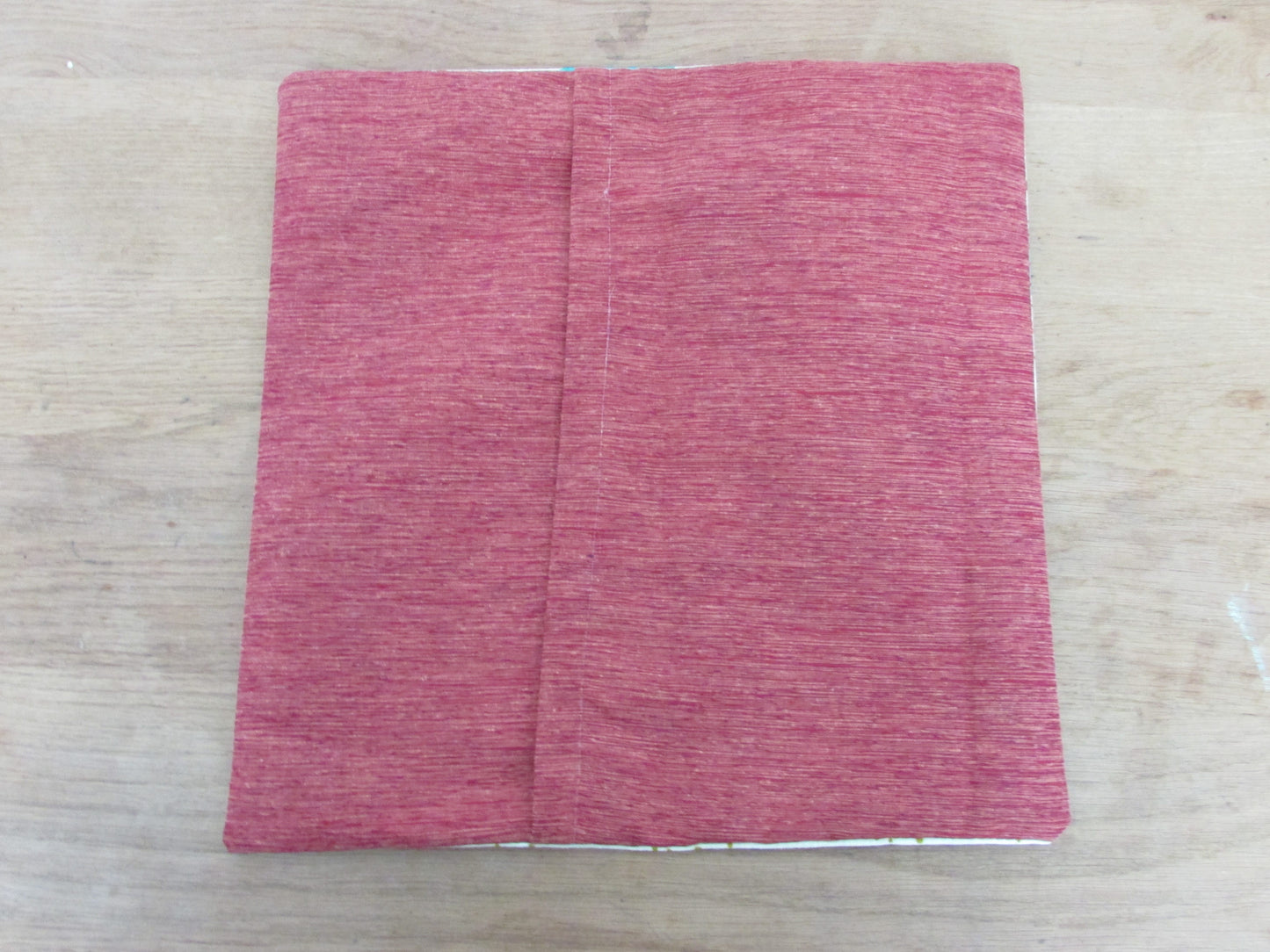 Home-made 1950s-inspired Atomic Starburst pattern cushion cover with contrast green OR rust reverse