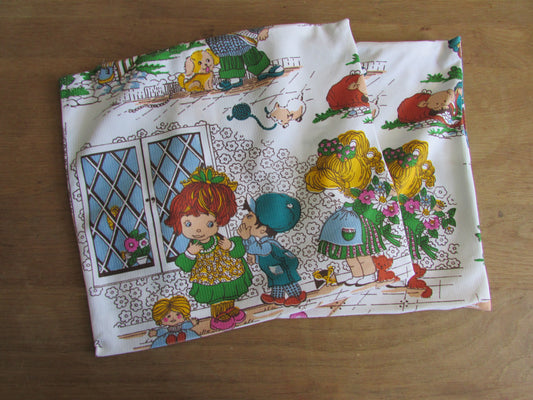 Two vintage hand-made Holly Hobbie-style cushion covers