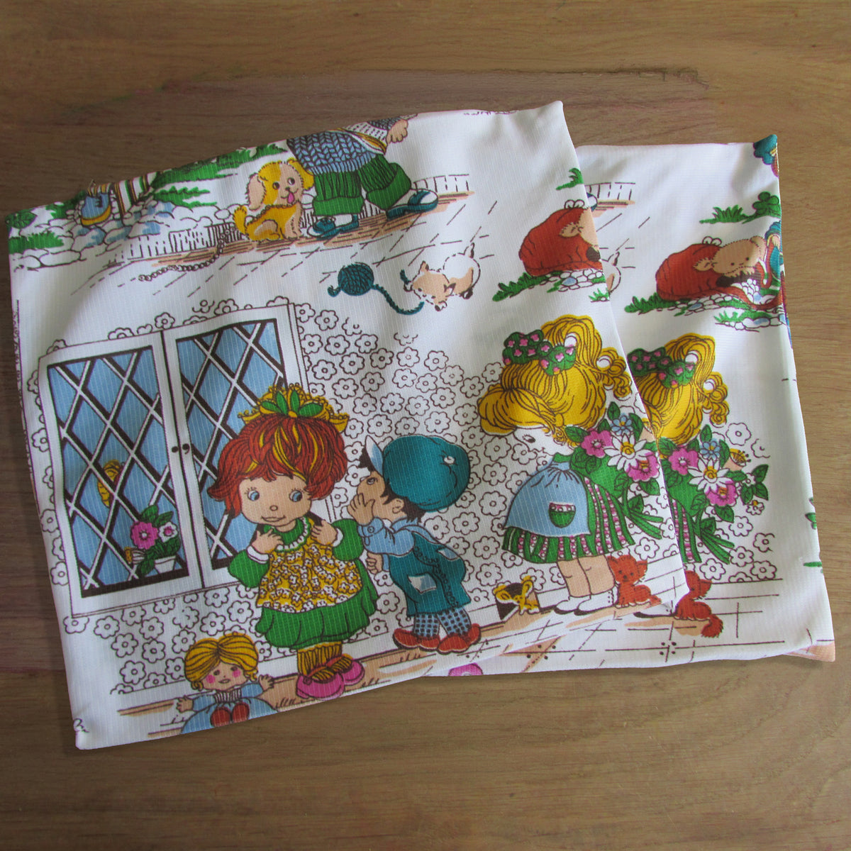 Pair of vintage handmade 1970s Holly Hobbie-style cushion covers, 15" x 15"