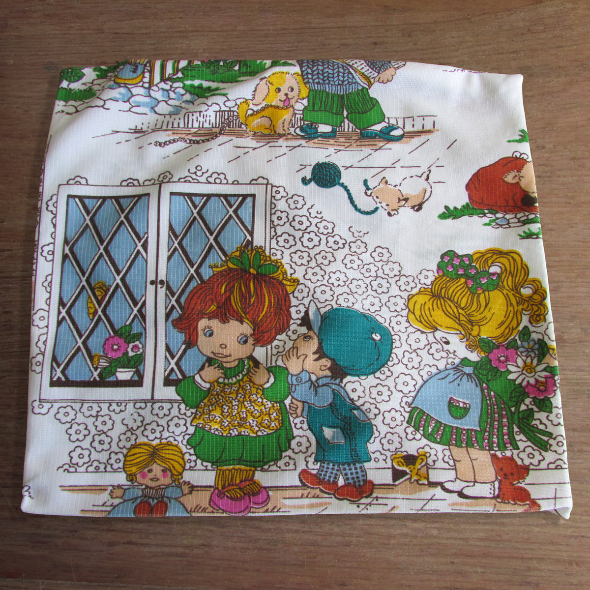 Pair of vintage handmade 1970s Holly Hobbie-style cushion covers, 15" x 15"