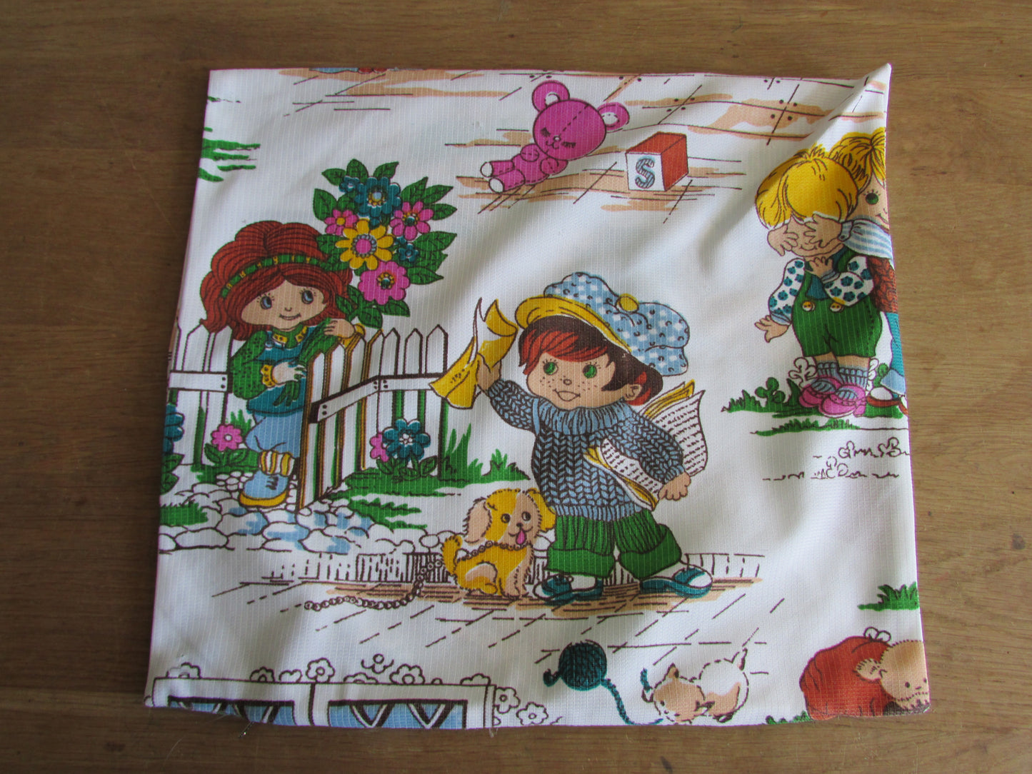 Two vintage hand-made Holly Hobbie-style cushion covers