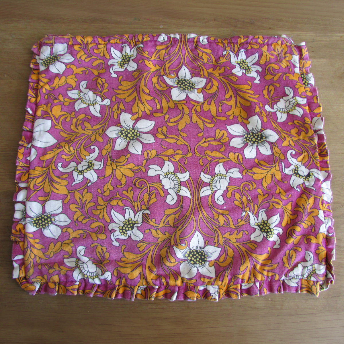 Pair of 1970s pink orange floral frilled cushion covers, 18" x 15"