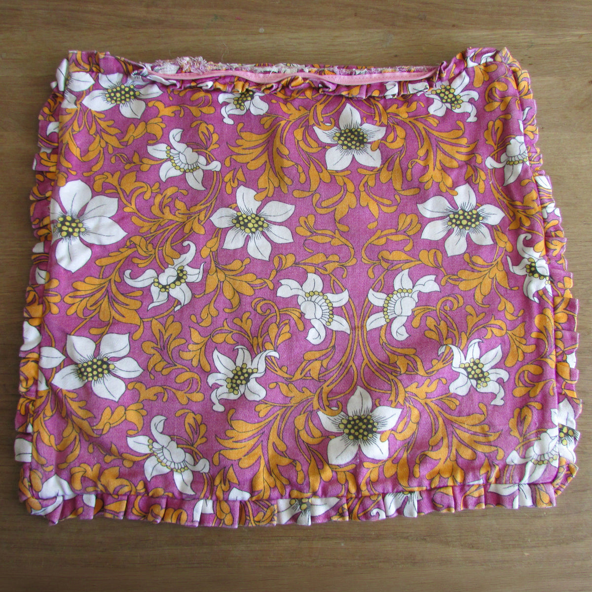 Pair of 1970s pink orange floral frilled cushion covers, 18" x 15"