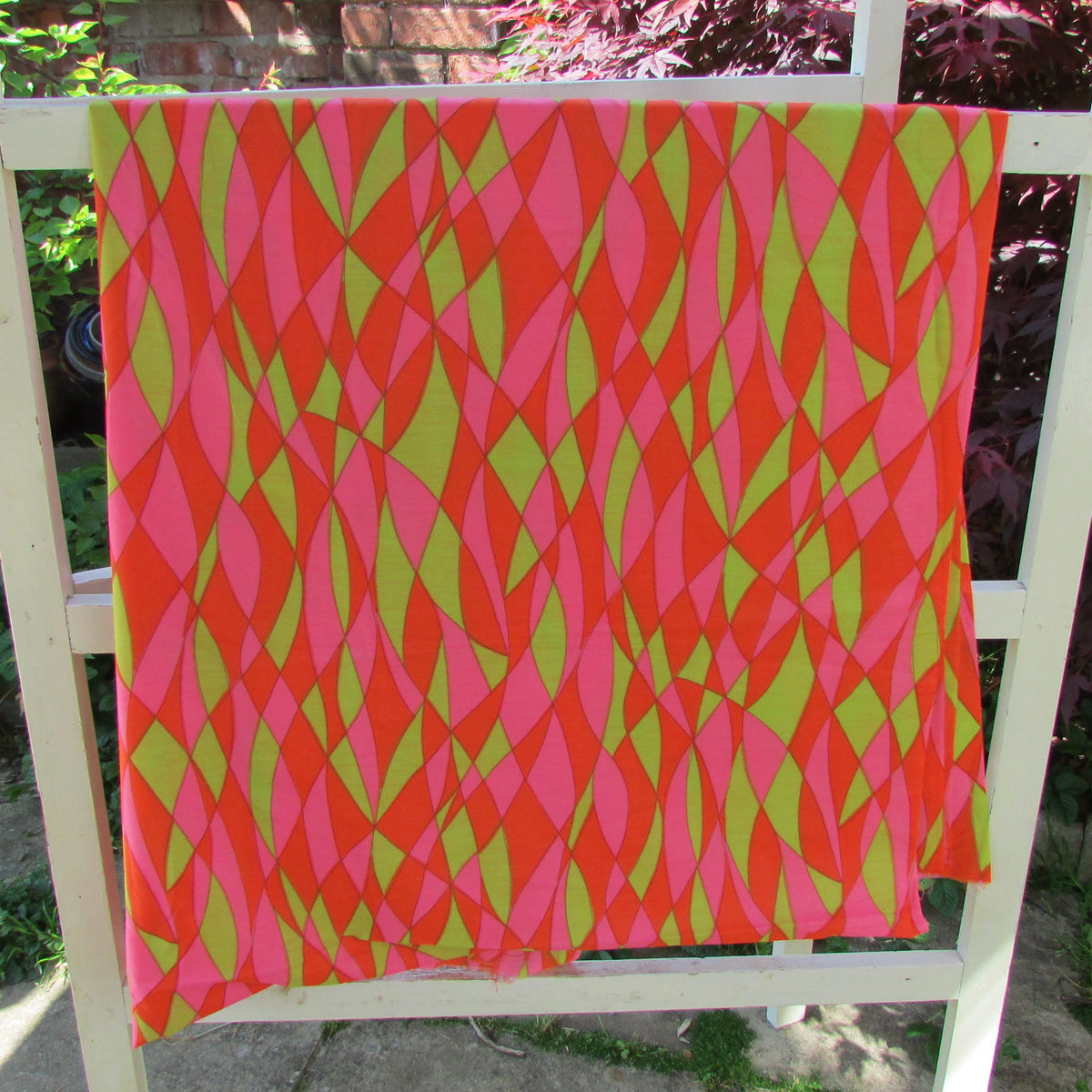1970s pink orange & green psychedelic geometric Terylene fabric, 35.5" x 180"