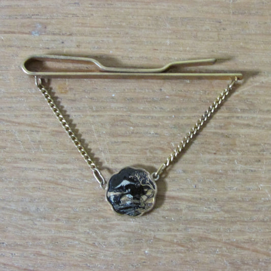 1960s gold-tone Damascene tie clip with hanging landscape medallion