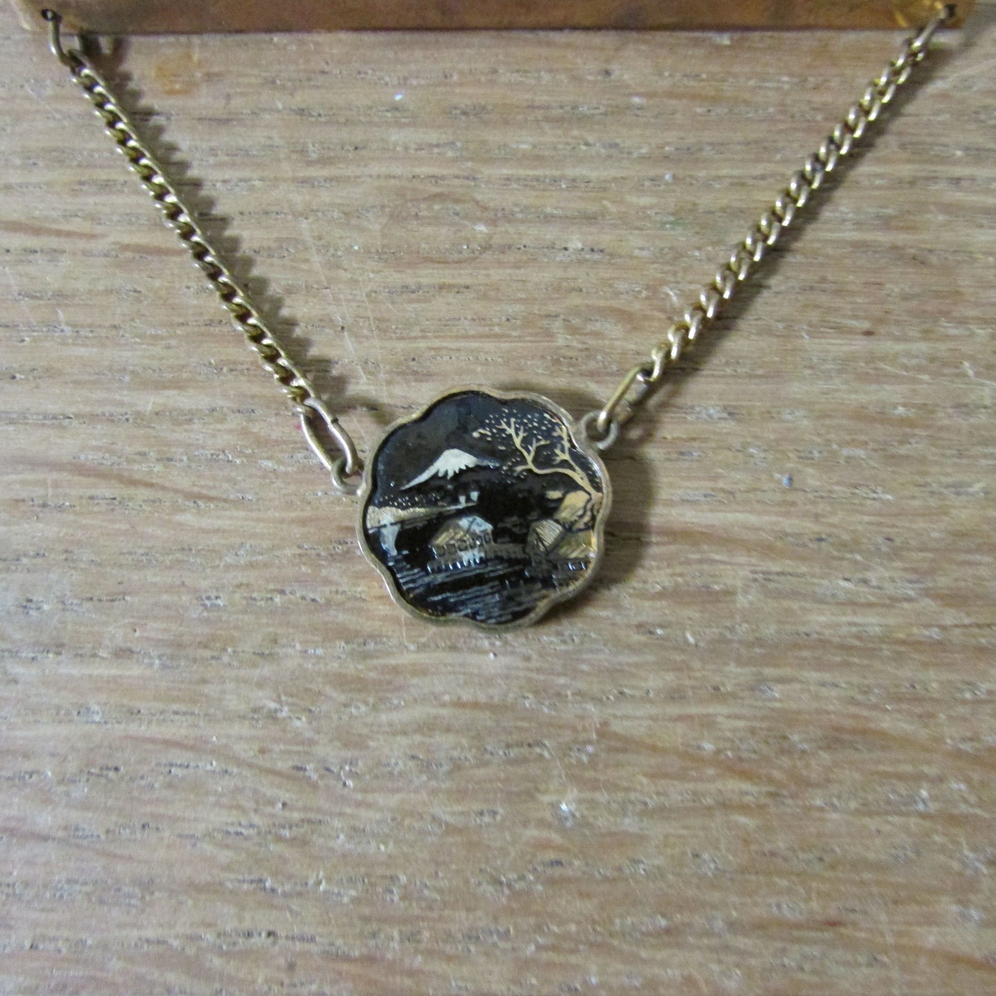 1960s gold-tone Damascene tie clip with hanging landscape medallion