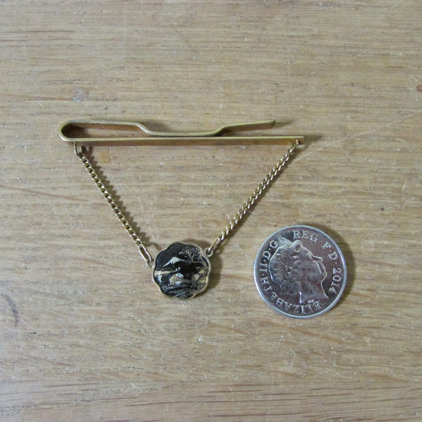 1960s gold-tone Damascene tie clip with hanging landscape medallion