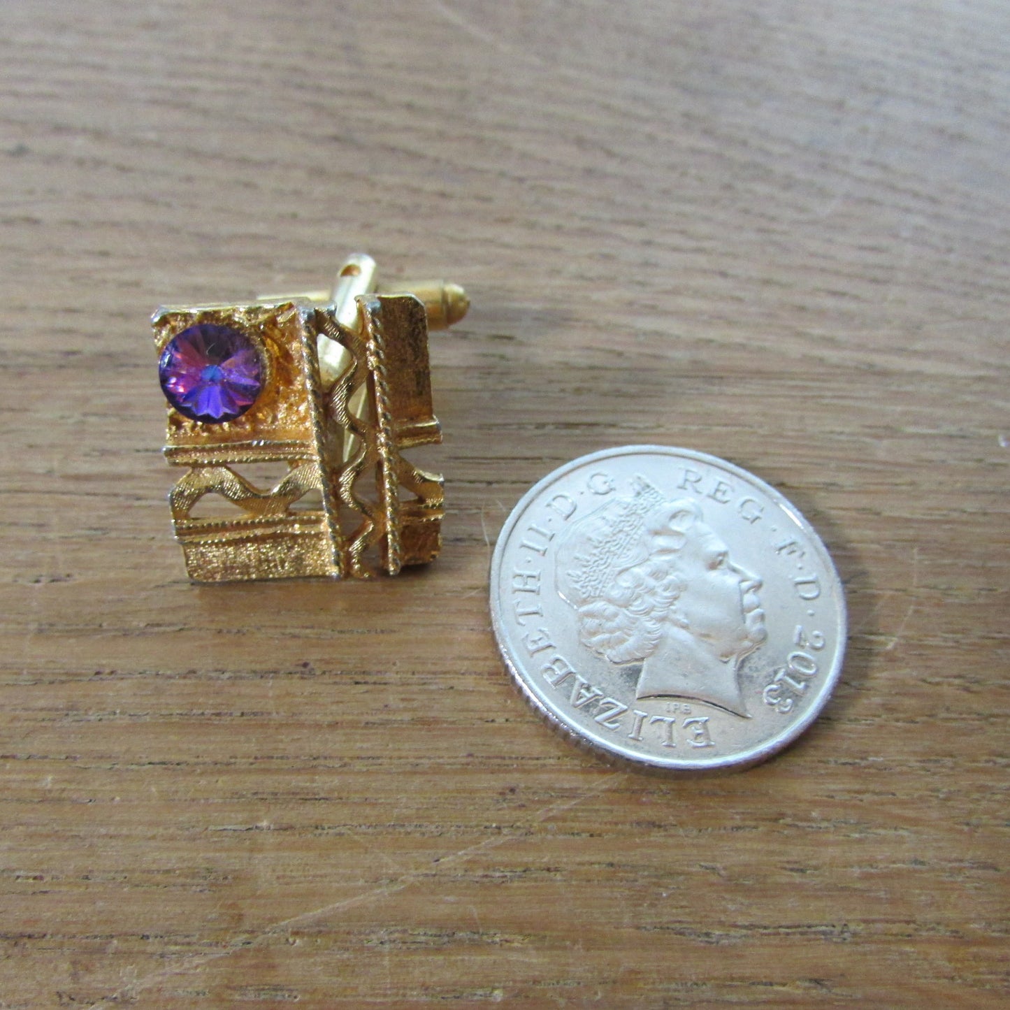 1960s Merlin diamond-cut gold-tone cufflinks with purple rhinestone detail