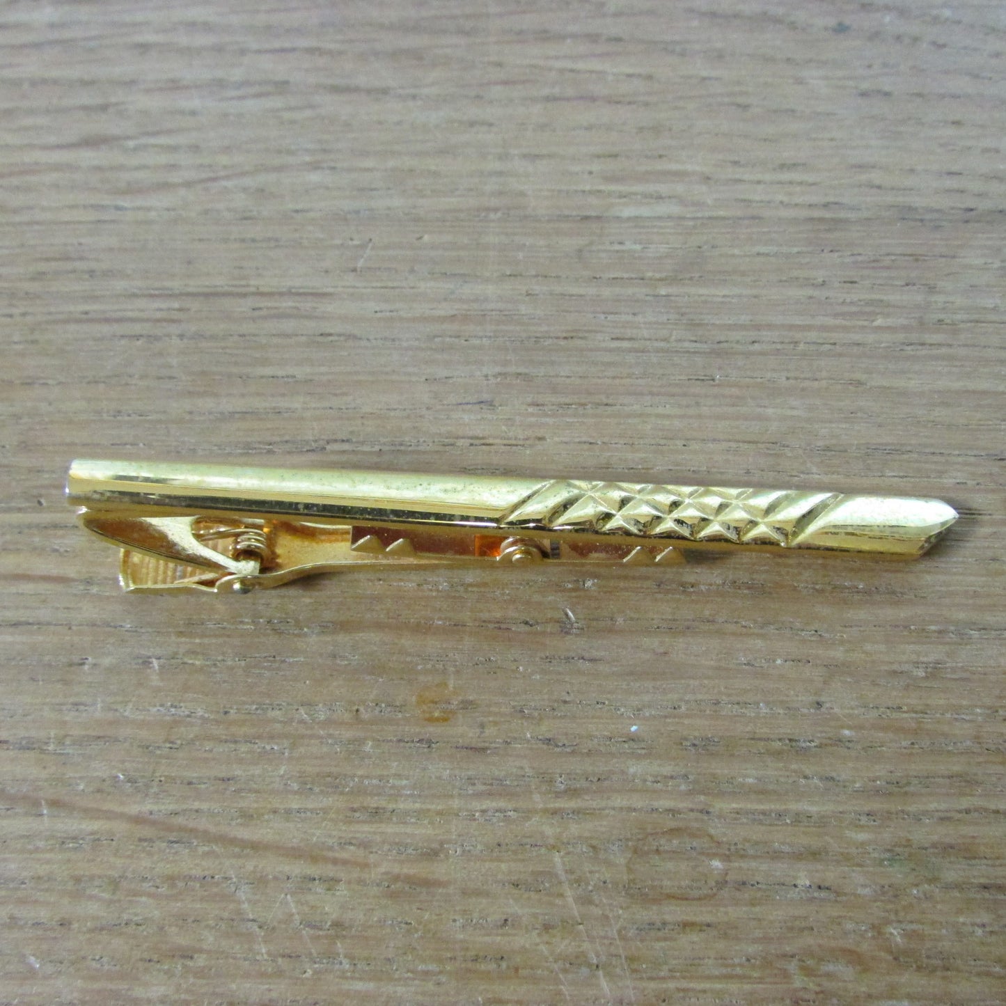 Vintage Sophos gold-tone tie clip in gold-coloured tin