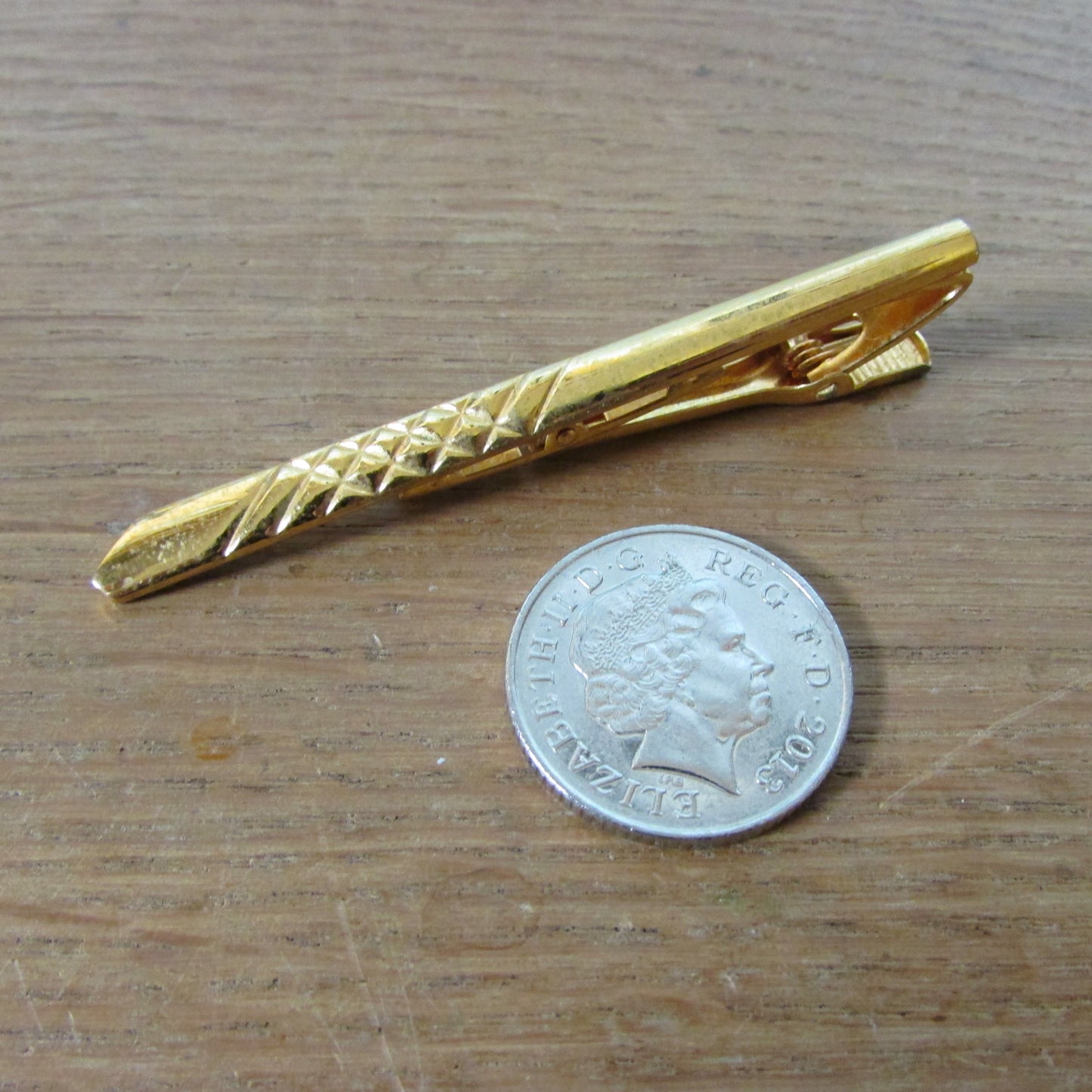 Vintage Sophos gold-tone tie clip in gold-coloured tin