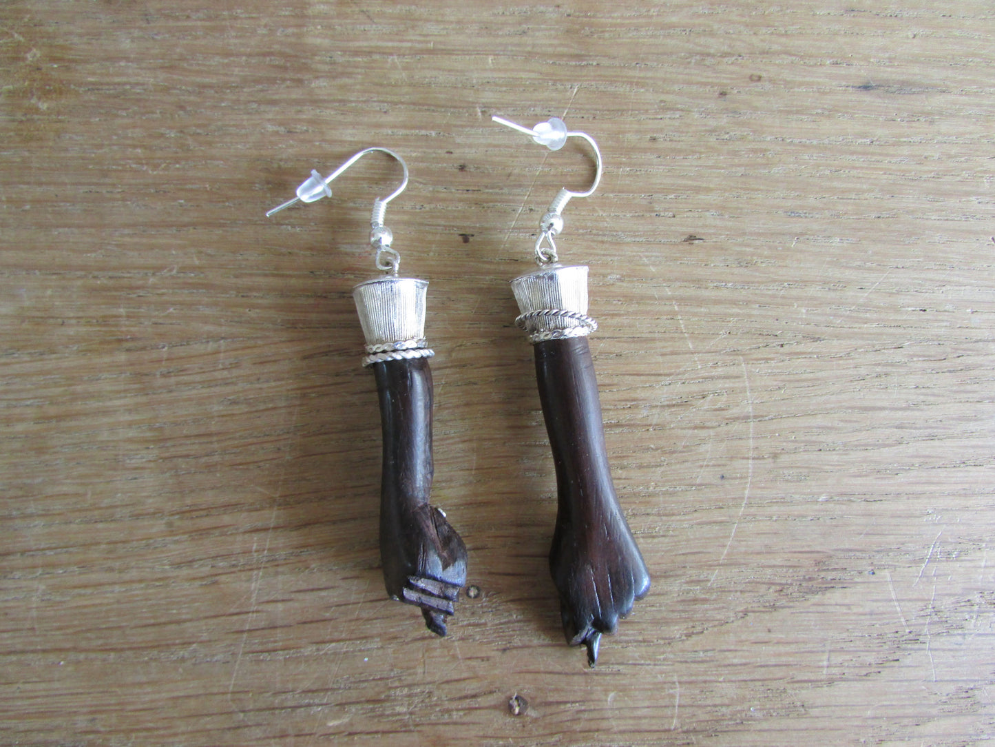 Home-made earrings made using vintage resin 'hands' & silver plated findings
