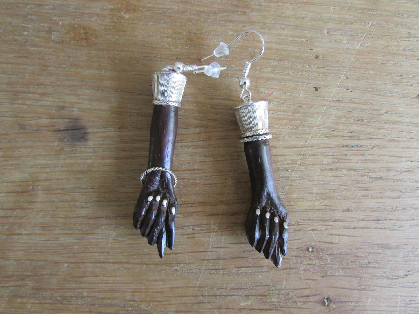 Home-made earrings made using vintage resin 'hands' & silver plated findings
