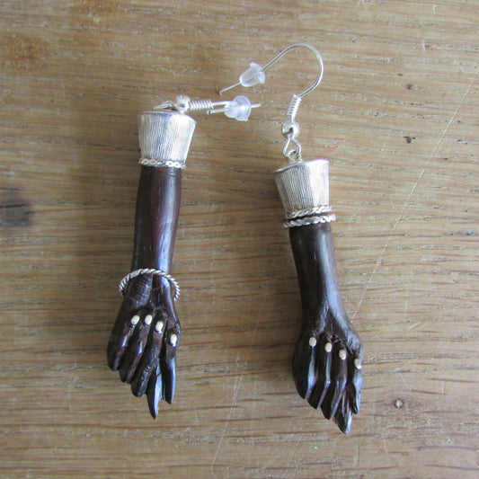 Home-made earrings made using vintage Gothic resin 'hands' & silver plated findings