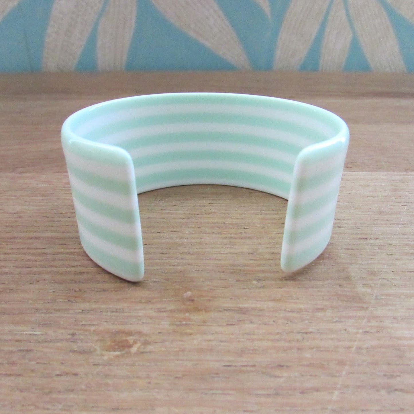 circa. 1980s mint green & white striped plastic open cuff bangle