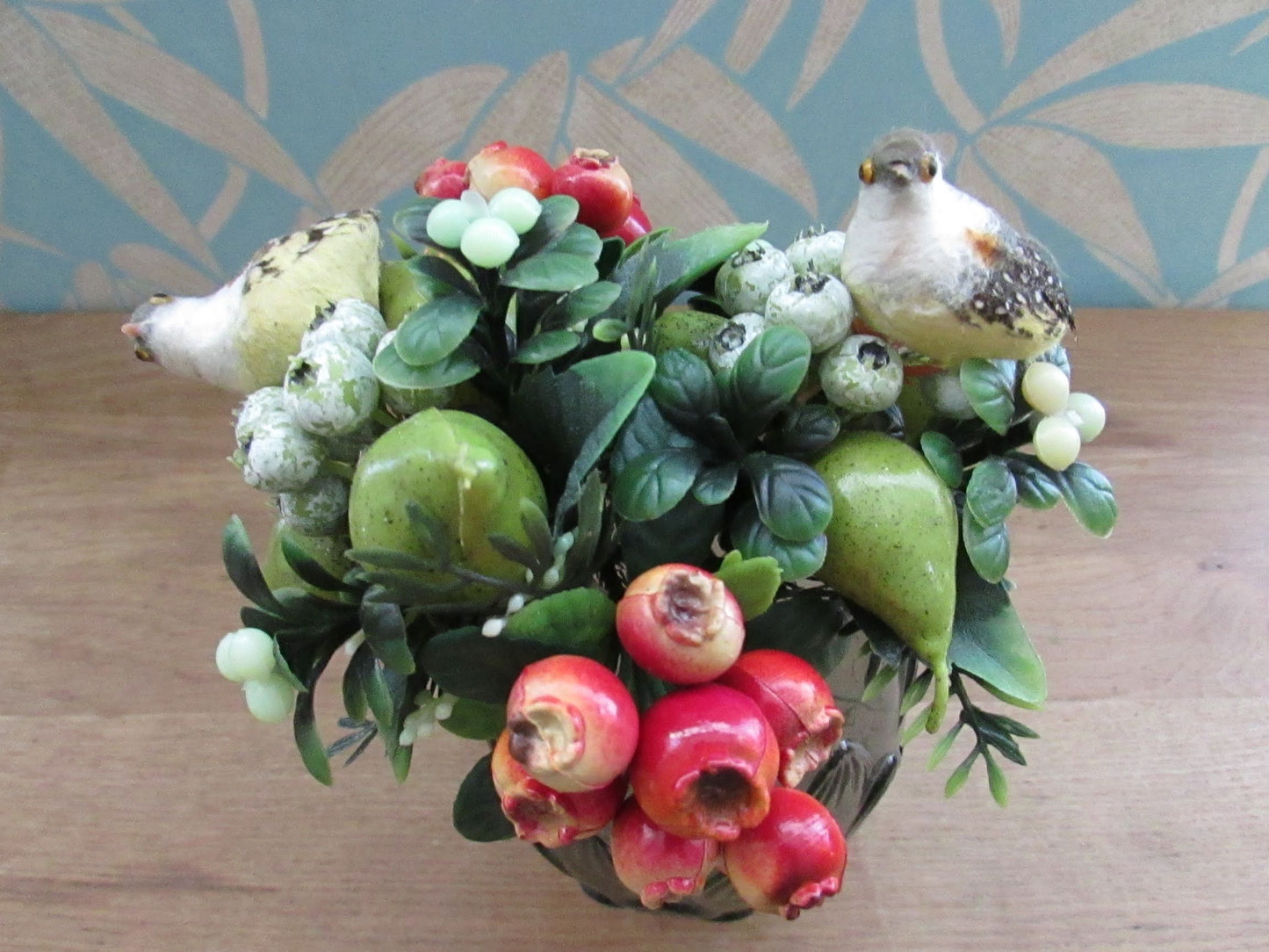 Two 1960s plastic partridges on pear tree branches, & red rosehip berry sprigs