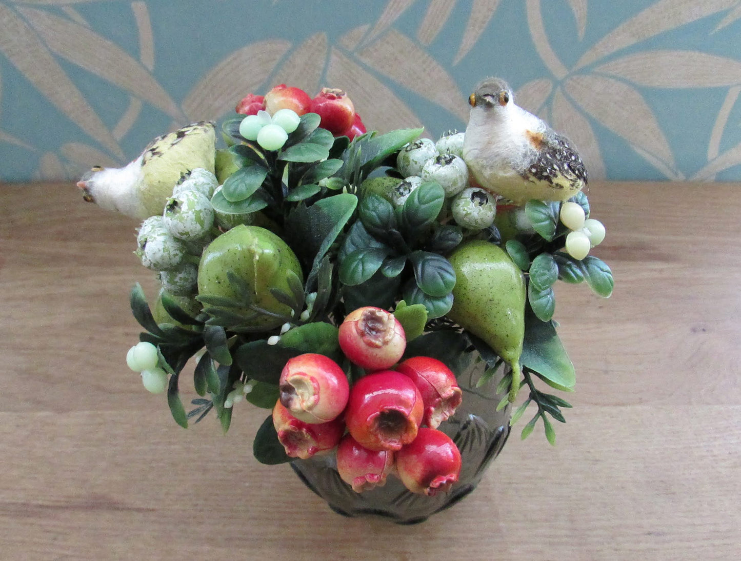 Two 1960s plastic partridges on pear tree branches, & red rosehip berry sprigs