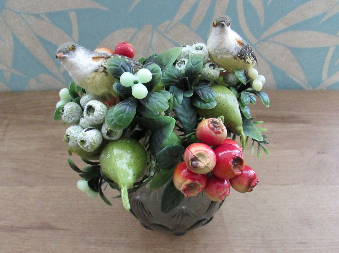 Two 1960s plastic partridges on pear tree branches, & red rosehip berry sprigs