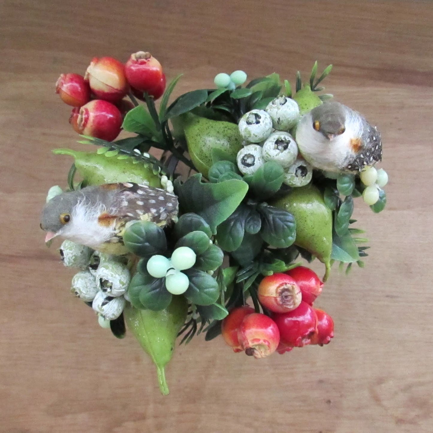 Two 1960s plastic partridges on pear tree branches, & red rosehip berry sprigs