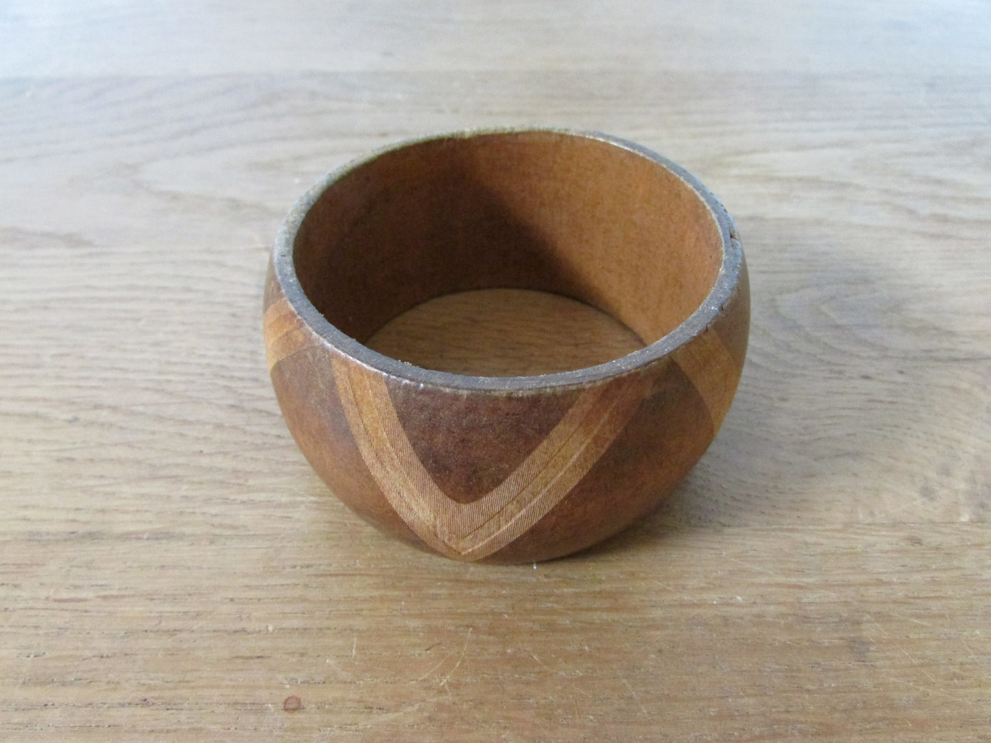 1970s wooden bangle with contrast chevron-style inlay