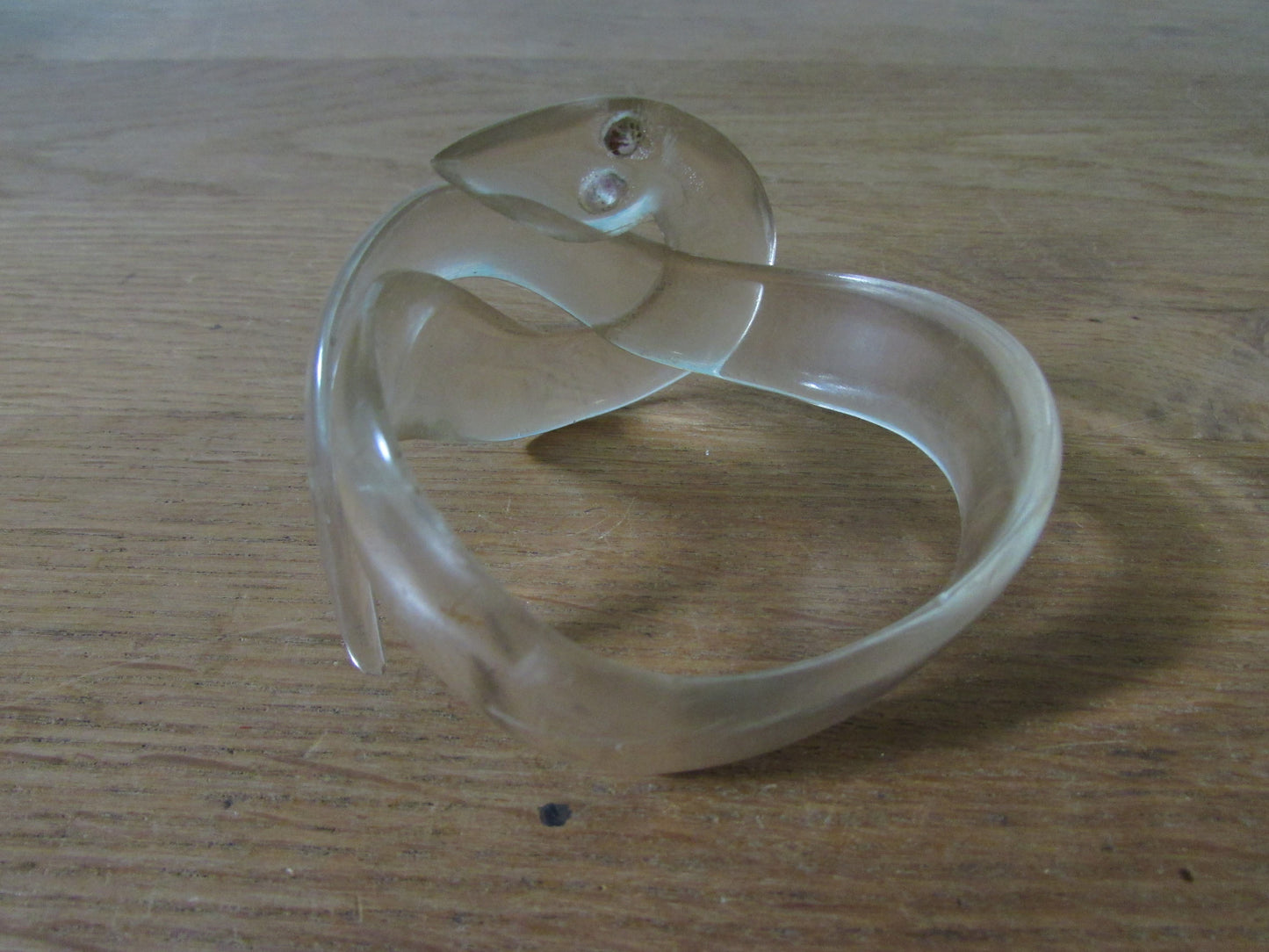 Vintage clear chunky lucite snake bangle with rhinestone eyes