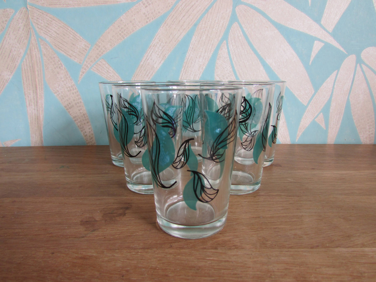 Set of six 1950s green & black leaf patterned shot glasses, made in England