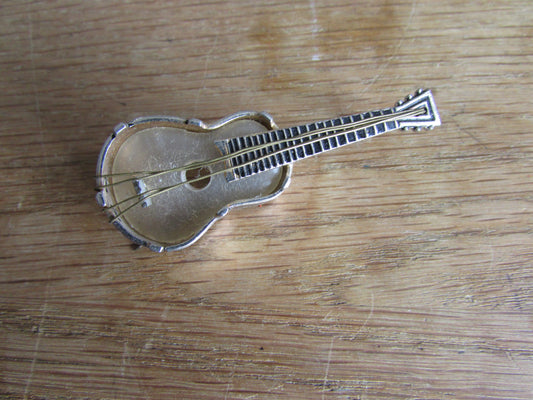 Vintage MOP & silver-tone Toledo guitar brooch