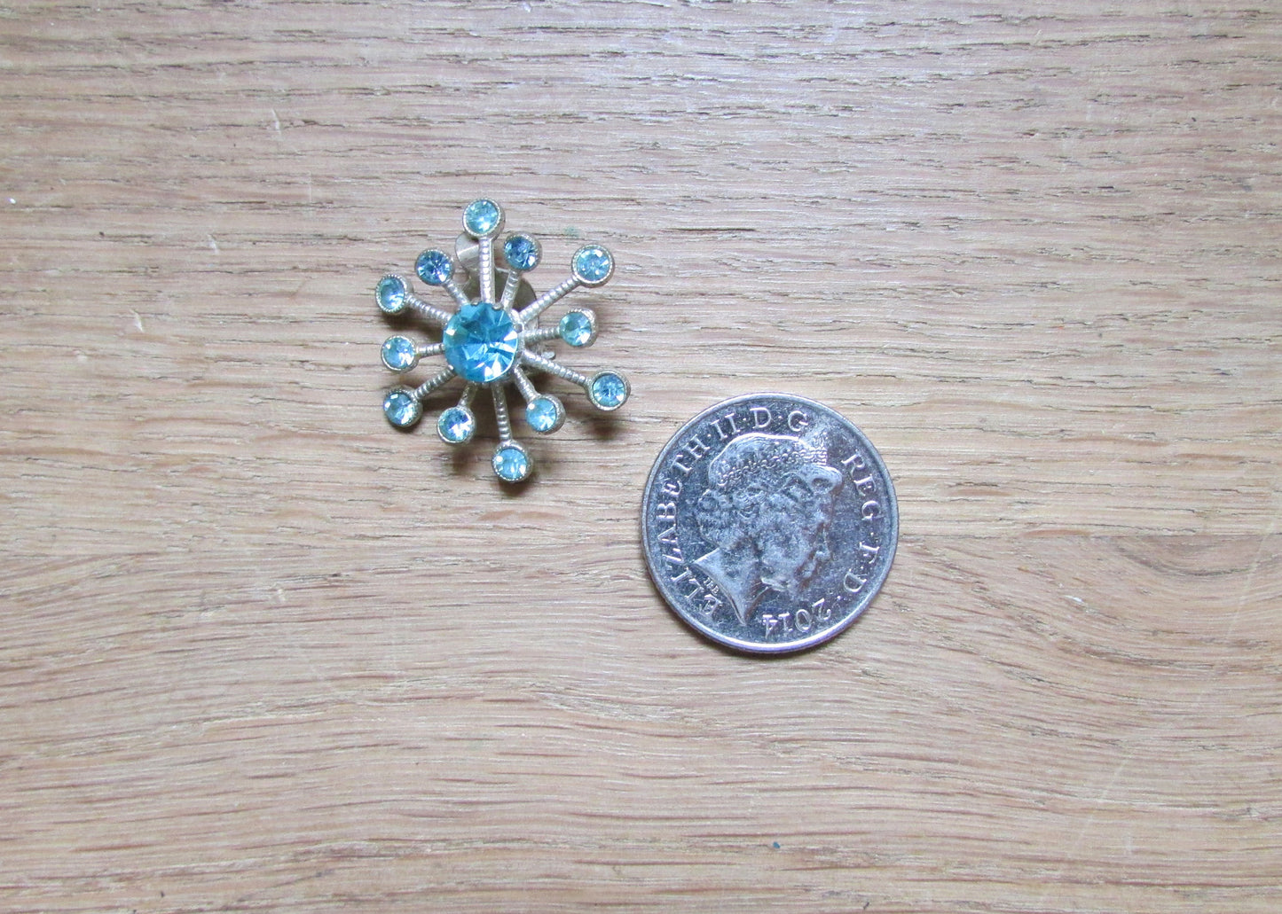 1950s silver-tone & aqua glass rhinestone starburst clip-on earrings