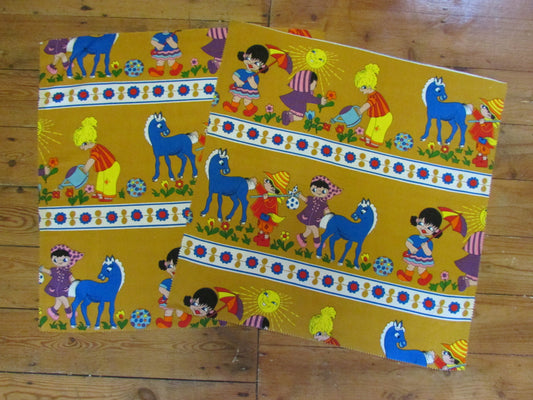 Pair of brightly coloured 1970s children's/nursery fabric squares