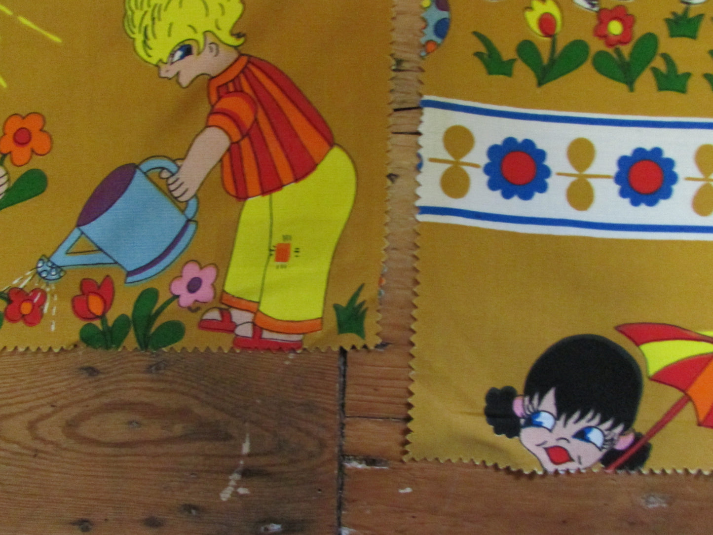 Pair of brightly coloured 1970s children's/nursery fabric squares