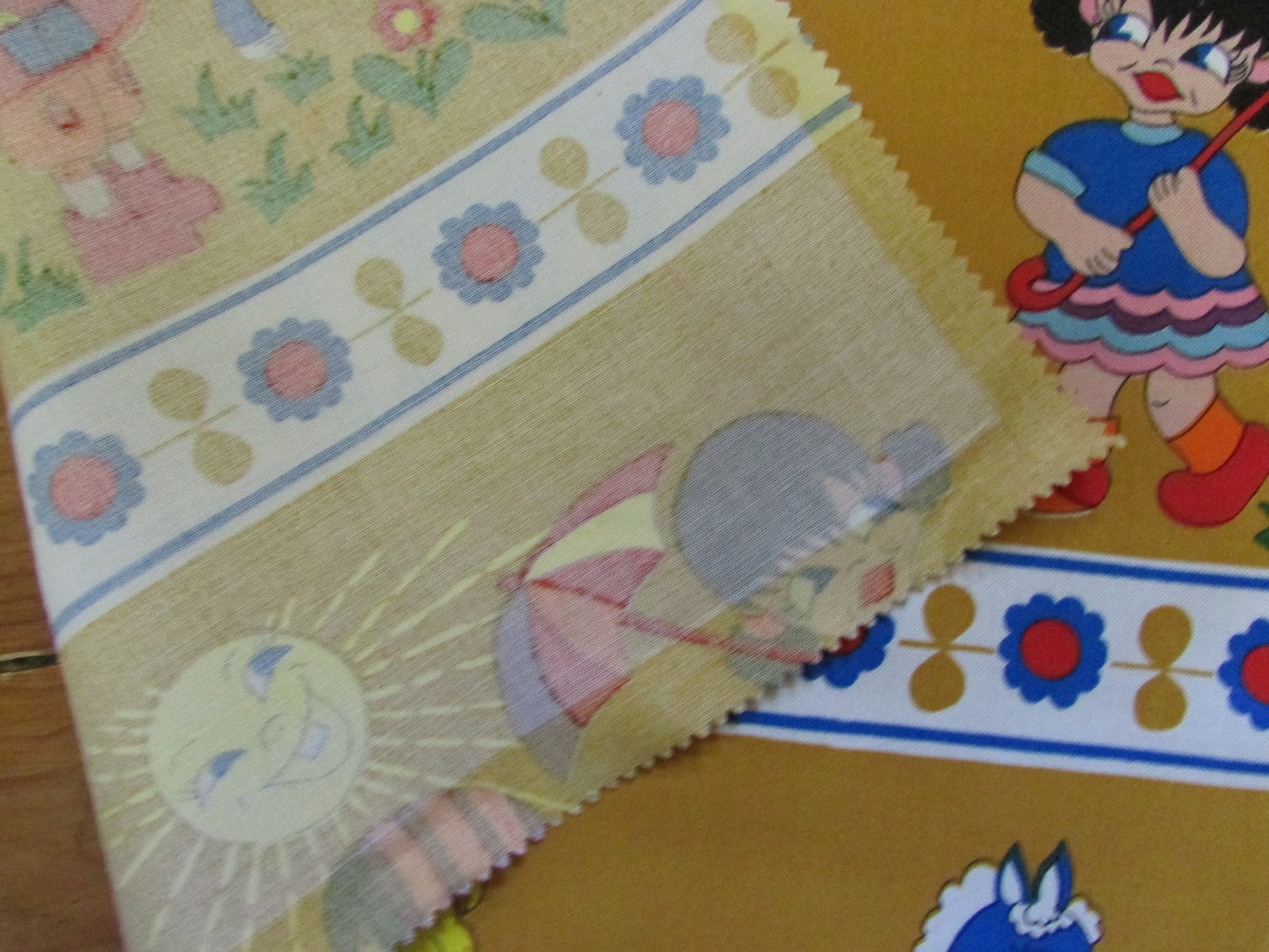 Pair of brightly coloured 1970s children's/nursery fabric squares