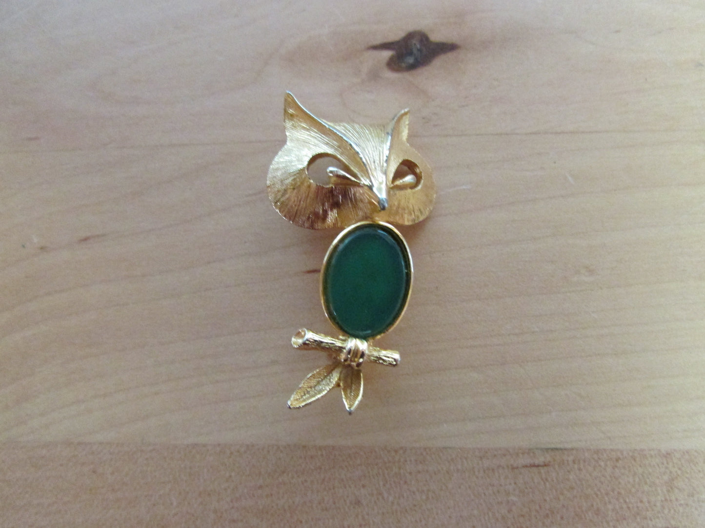 Vintage Liz Clairborne modernist-style gold-tone owl brooch with green cabochon belly