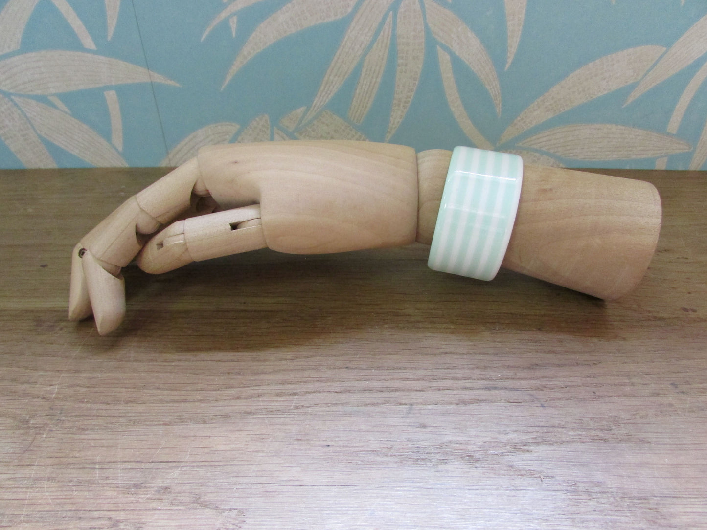 circa. 1980s mint green & white striped plastic open cuff bangle