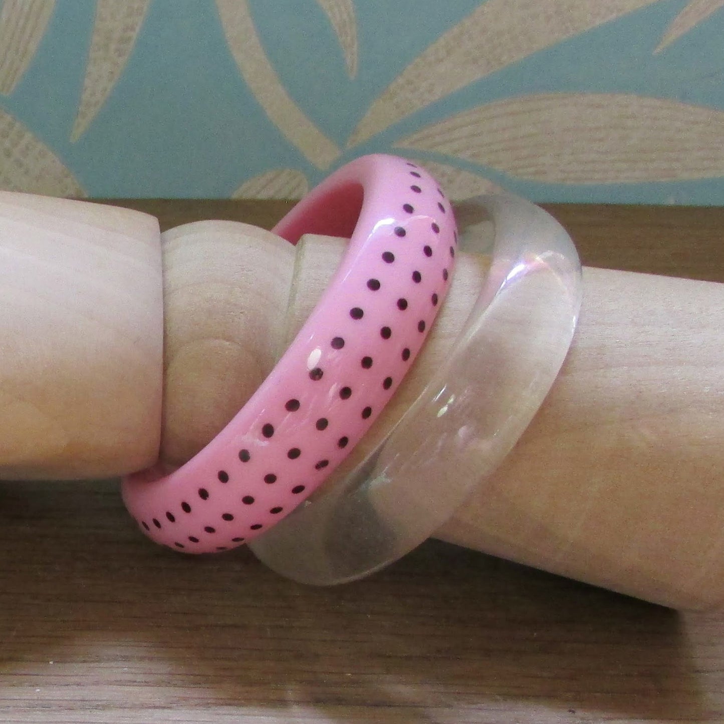 circa. 1980s clear translucent, and pink polka dot acrylic bangle set