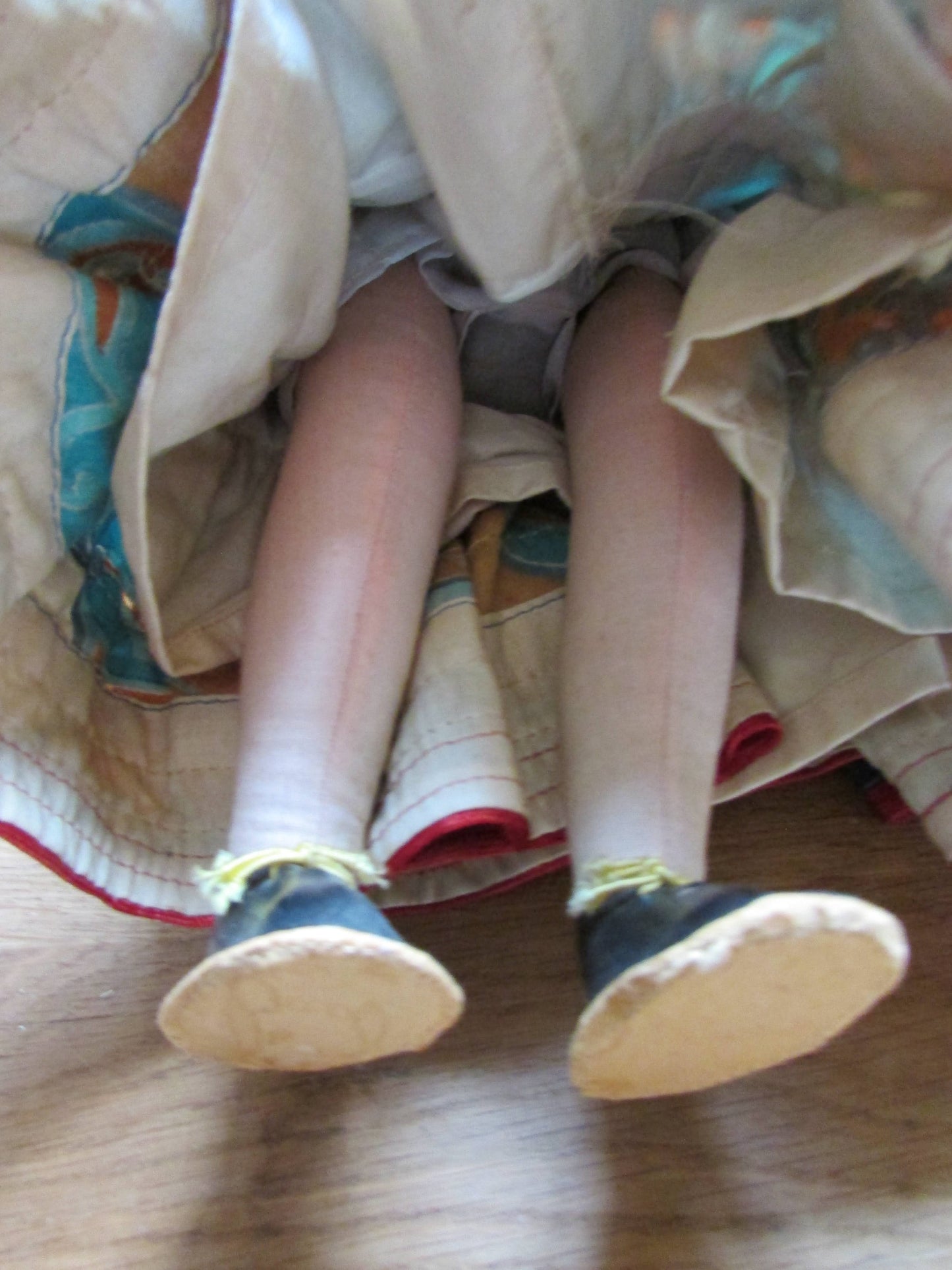 Vintage Hungarian folk art doll in traditional dress, with handpainted porcelain face, & cloth limbs