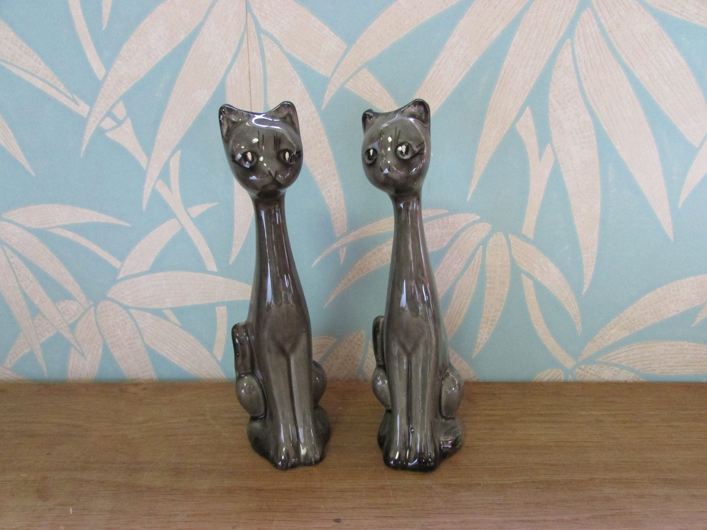Pair of unusual mid-century grey/charcoal ceramic long-necked scoop head cat vases
