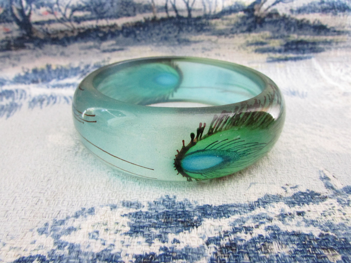 Vintage resin peacock feather bangle